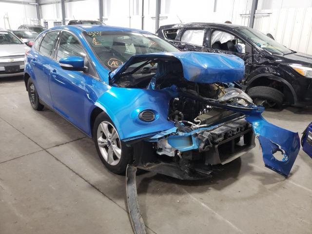 FORD FOCUS SE 2014 with VIN 1FADP3K2XEL374169 - Photo from auction