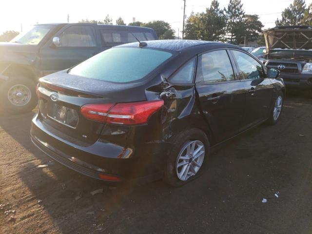 Photo 4 from auction – 2018 FORD FOCUS SE with VIN 1FADP3F21JL215416