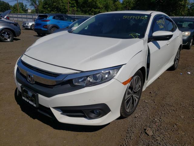 Photo 2 from auction – 2016 HONDA CIVIC EX with VIN 2HGFC1F34GH642902