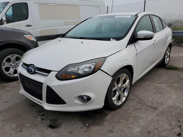 Photo 2 from auction – 2014 FORD FOCUS TITA with VIN 1FADP3J2XEL128482