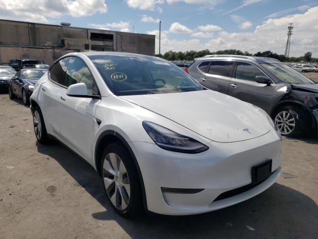 TESLA MODEL Y 2021 with VIN 5YJYGDEE6MF077747 - Photo from auction