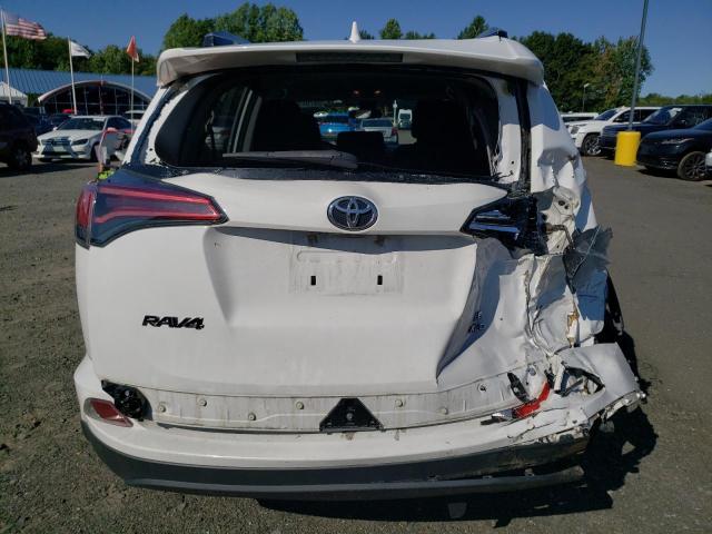 Photo 9 from auction – 2018 TOYOTA RAV4 LE with VIN 2T3BFREV2JW772240