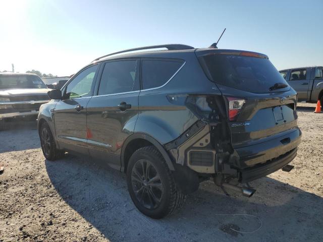 Photo 3 from auction – 2018 FORD ESCAPE SEL with VIN 1FMCU0HD8JUA56332