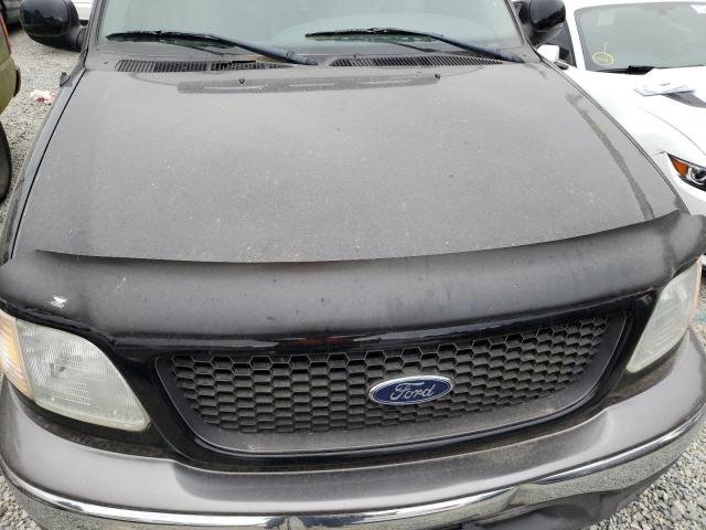 Photo 9 from auction – 2002 FORD F150 with VIN 1FTRX18L22KA30907