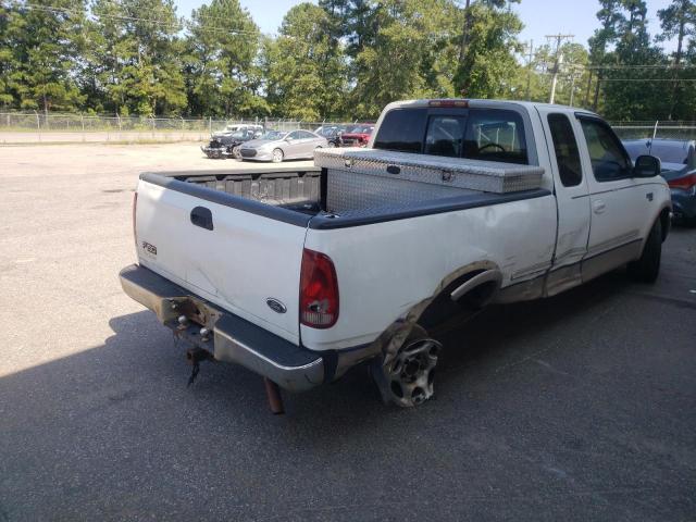 Photo 4 from auction – 1998 FORD F150 with VIN 1FTRX17L0WNB27173