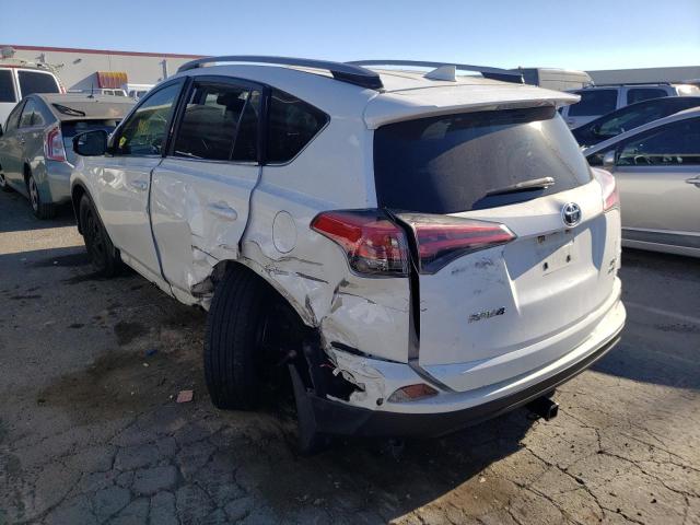 Photo 3 from auction – 2017 TOYOTA RAV4 LE with VIN JTMBFREV5HJ137957