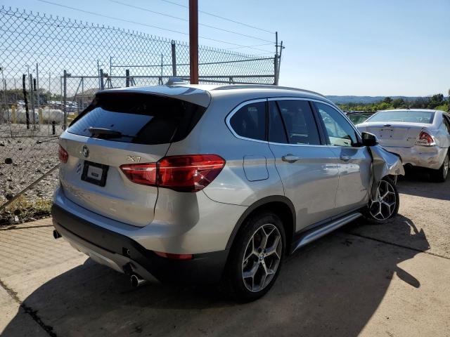 Photo 4 from auction – 2017 BMW X1 XDRIVE2 with VIN WBXHT3Z3XH4A65506
