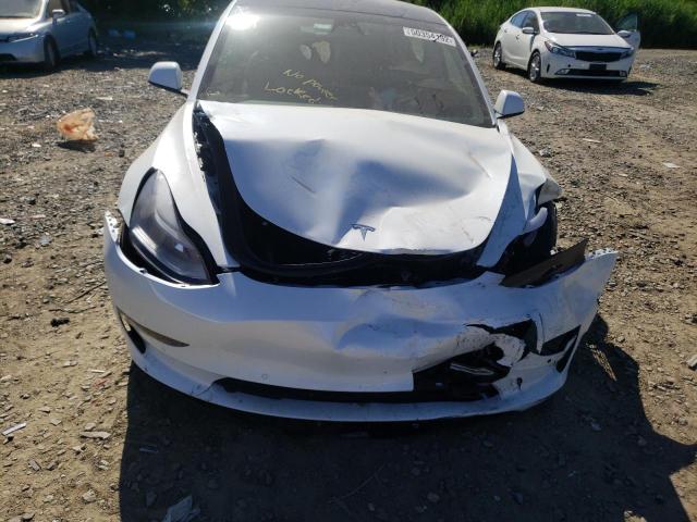 Photo 9 from auction – 2022 TESLA MODEL 3 with VIN 5YJ3E1EBXNF112215