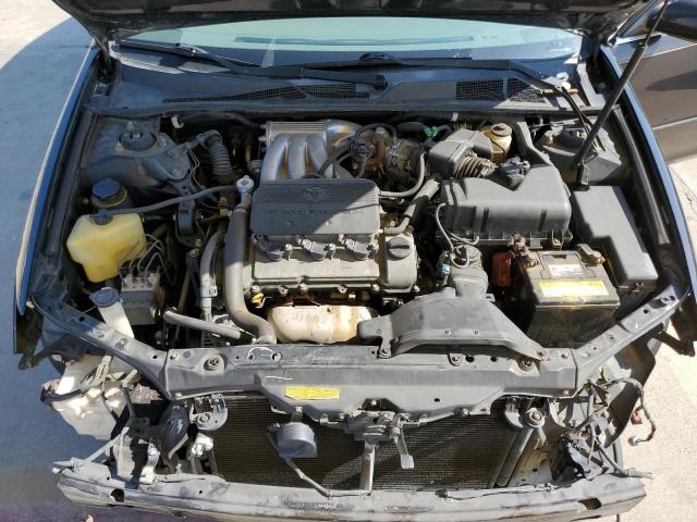 Photo 7 from auction – 2002 TOYOTA CAMRY LE with VIN JTDBF32K220017053