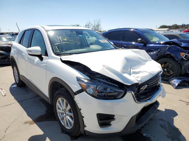 MAZDA CX-5 TOURI 2016 with VIN JM3KE2CY6G0645244 - Photo from auction