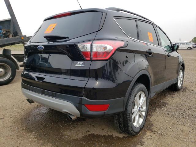 Photo 4 from auction – 2018 FORD ESCAPE SE with VIN 1FMCU9GD8JUC82666