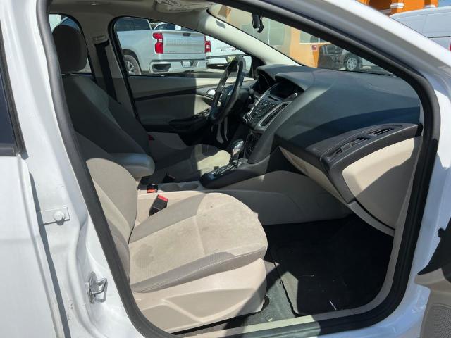 Photo 5 from auction – 2014 FORD FOCUS SE with VIN 1FADP3F20EL301046