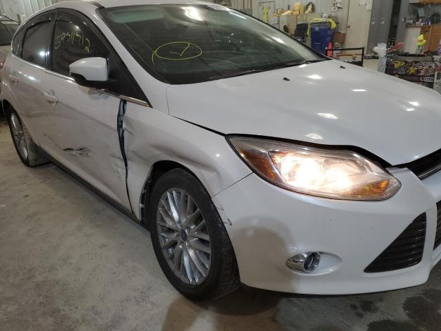 Photo 9 from auction – 2012 FORD FOCUS SEL with VIN 1FAHP3M28CL313107