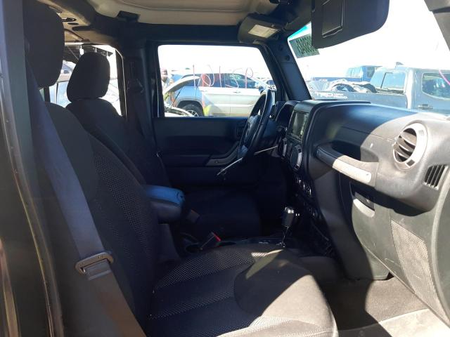Photo 5 from auction – 2016 JEEP WRANGLER U with VIN 1C4BJWDG4GL148208
