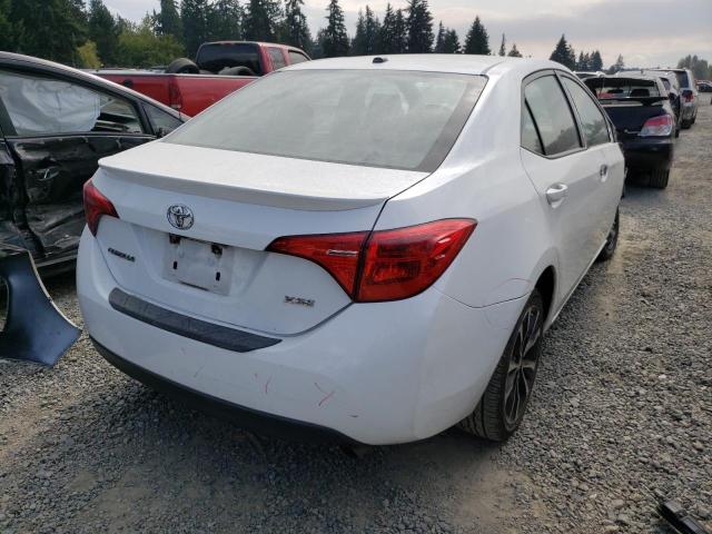Photo 4 from auction – 2017 TOYOTA COROLLA L with VIN 5YFBURHE2HP701027
