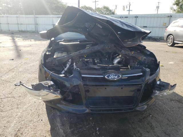 Photo 9 from auction – 2013 FORD FOCUS S with VIN 1FADP3E24DL380432