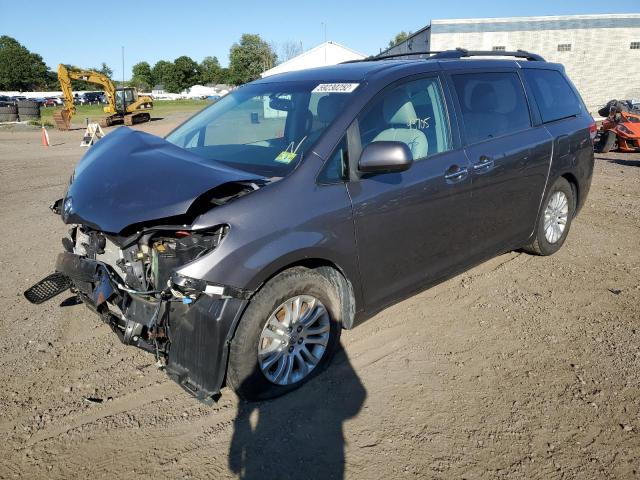 Photo 2 from auction – 2014 TOYOTA SIENNA XLE with VIN 5TDYK3DC1ES456838