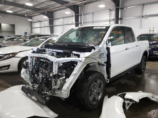Photo 2 from auction – 2022 HONDA RIDGELINE with VIN 5FPYK3F70NB031414
