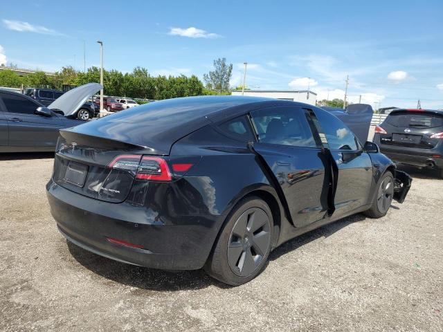 Photo 4 from auction – 2021 TESLA MODEL 3 with VIN 5YJ3E1EB3MF918136