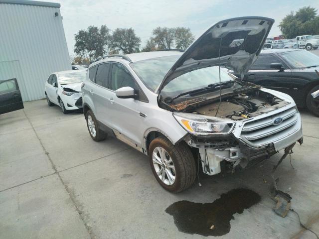 FORD ESCAPE SE 2018 with VIN 1FMCU9GD0JUB34527 - Photo from auction