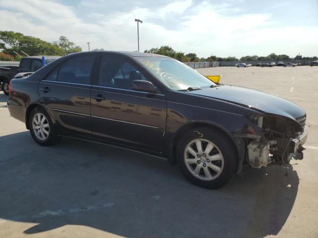 Photo 9 from auction – 2002 TOYOTA CAMRY LE with VIN JTDBF32K220017053