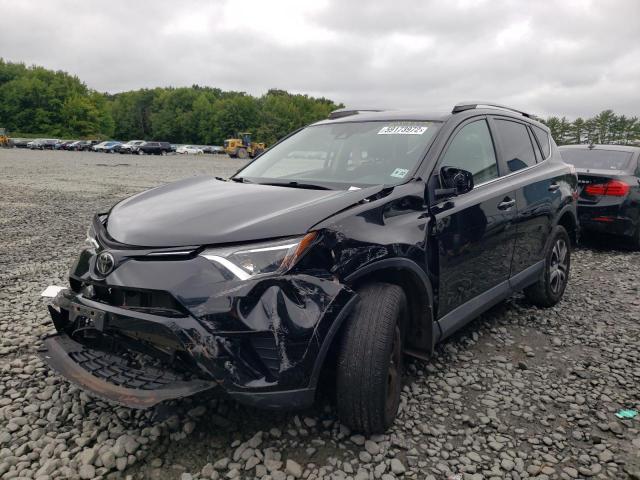 Photo 2 from auction – 2018 TOYOTA RAV4 LE with VIN 2T3BFREV8JW715444