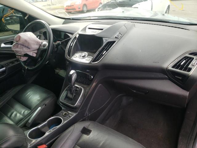 Photo 9 from auction – 2014 FORD ESCAPE TIT with VIN 1FMCU9J99EUB16585