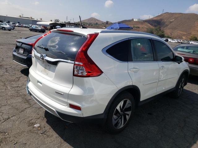 Photo 4 from auction – 2016 HONDA CR-V TOURI with VIN 5J6RM3H99GL017057