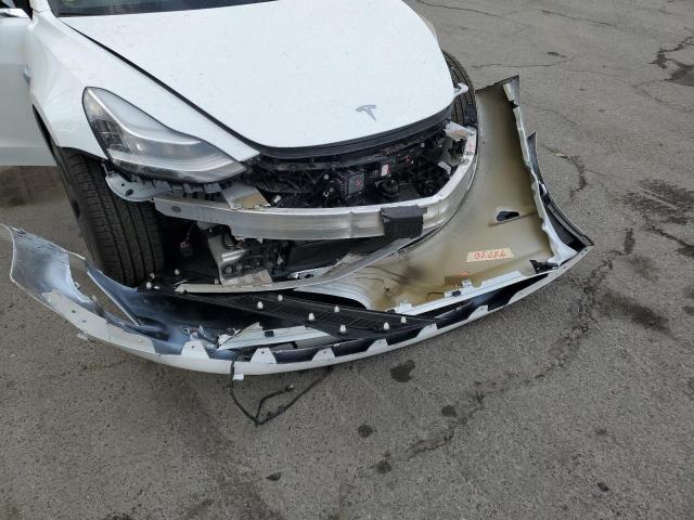 Photo 9 from auction – 2018 TESLA MODEL 3 with VIN 5YJ3E1EB3JF085210