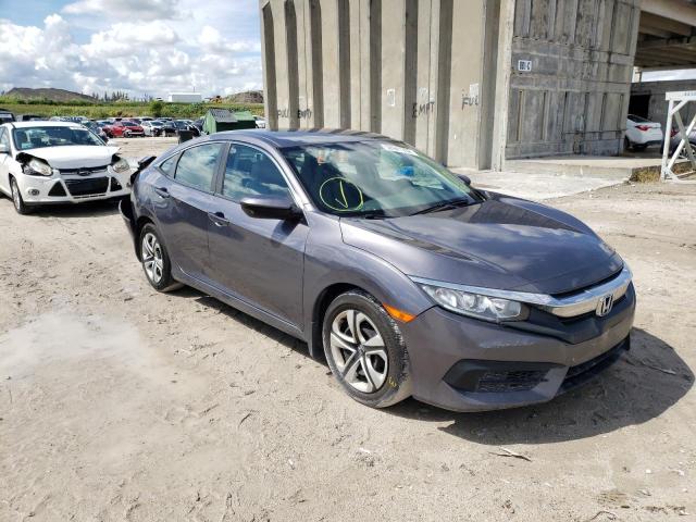 Photo 1 from auction – 2018 HONDA CIVIC LX with VIN 19XFC2F59JE044135