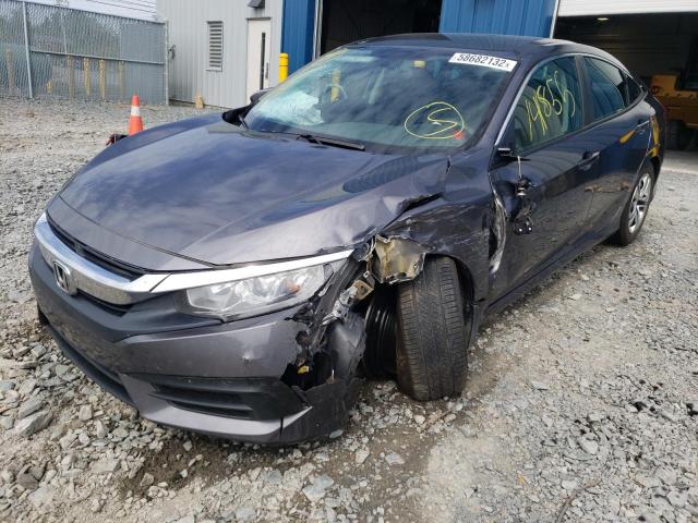 Photo 2 from auction – 2018 HONDA CIVIC LX with VIN 2HGFC2E57JH012131