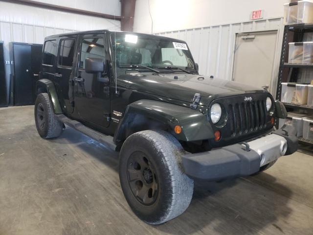JEEP WRANGLER U 2011 with VIN 1J4BA5H10BL557387 - Photo from auction