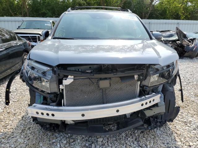 Photo 9 from auction – 2022 HONDA PASSPORT E with VIN 5FNYF8H53NB004973