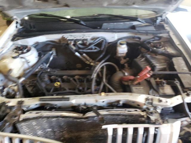Photo 7 from auction – 2009 MERCURY MARINER PR with VIN 4M2CU877X9KJ24419