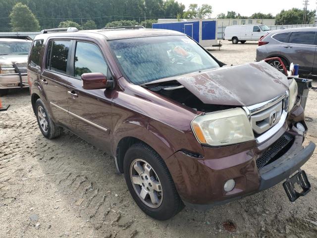 HONDA PILOT TOUR 2010 with VIN 5FNYF3H93AB012233 - Photo from auction