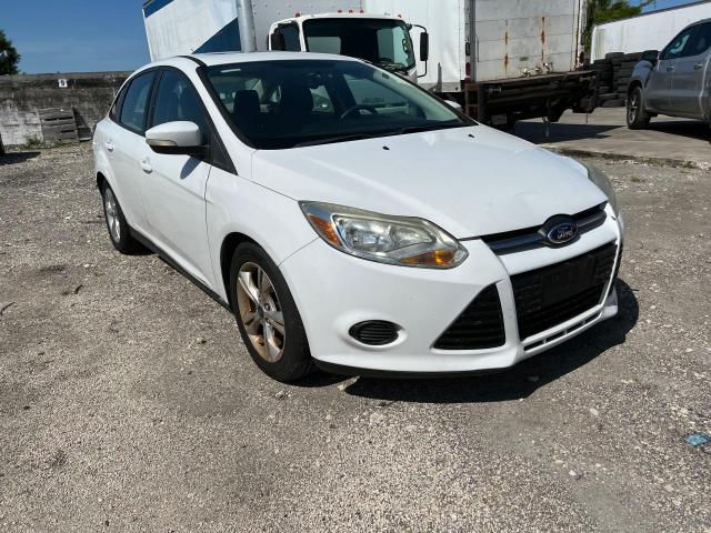 FORD FOCUS SE 2014 with VIN 1FADP3F20EL301046 - Photo from auction