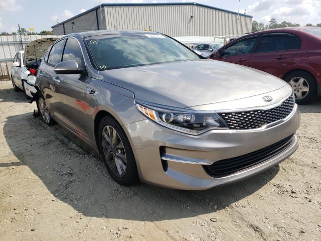 KIA OPTIMA EX 2018 with VIN 5XXGU4L31JG206069 - Photo from auction