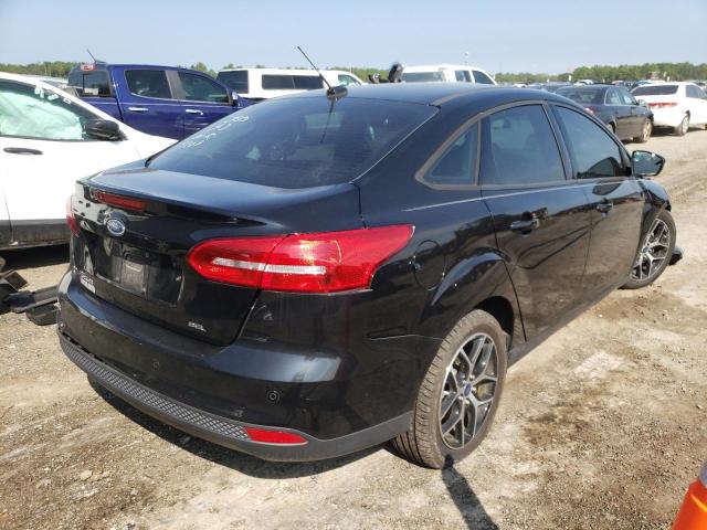 Photo 4 from auction – 2017 FORD FOCUS SEL with VIN 1FADP3H26HL212809
