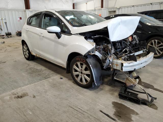 FORD FIESTA SE 2011 with VIN 3FADP4EJ2BM105831 - Photo from auction