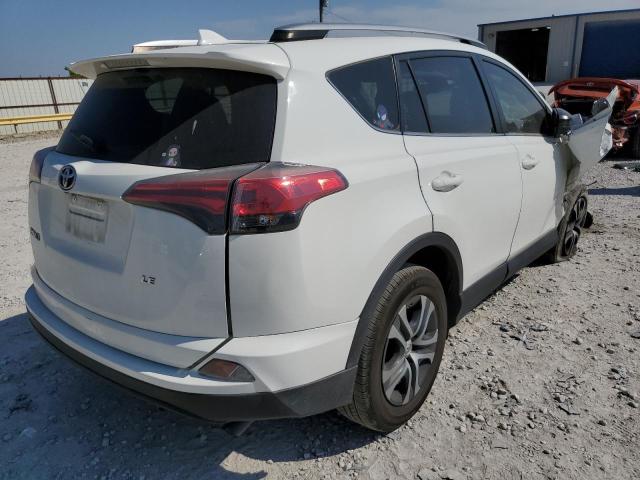 Photo 4 from auction – 2018 TOYOTA RAV4 LE with VIN JTMZFREV2JJ175926