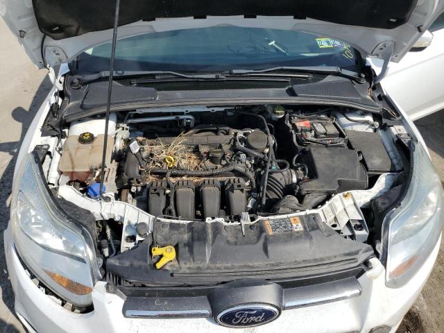 Photo 7 from auction – 2014 FORD FOCUS SE with VIN 1FADP3F2XEL301586