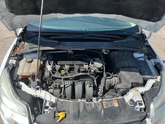 Photo 7 from auction – 2014 FORD FOCUS SE with VIN 1FADP3F20EL301046