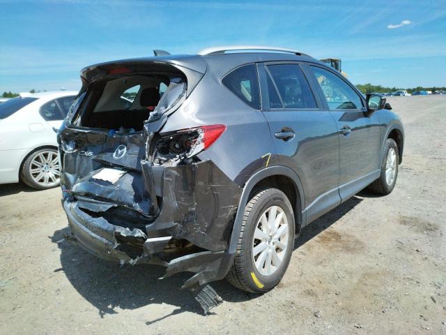 Photo 4 from auction – 2014 MAZDA CX-5 TOURI with VIN JM3KE2CY7E0321975