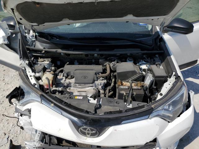 Photo 7 from auction – 2018 TOYOTA RAV4 LE with VIN JTMZFREV2JJ175926
