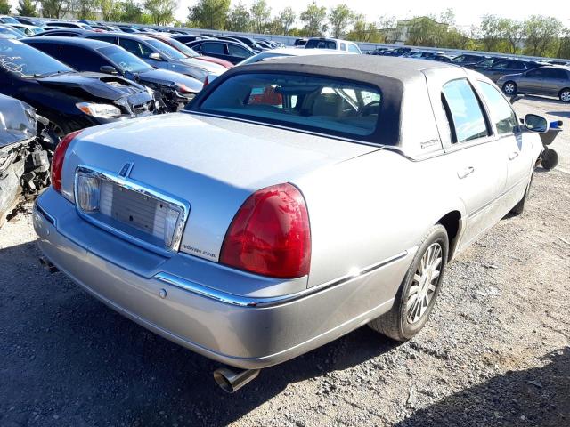 Photo 4 from auction – 2004 LINCOLN TOWN CAR E with VIN 1LNHM81W04Y660020