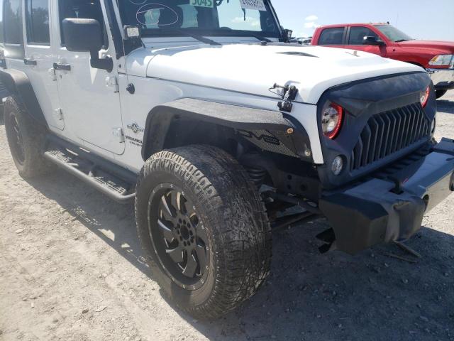 Photo 9 from auction – 2015 JEEP WRANGLER U with VIN 1C4BJWDG6FL563500