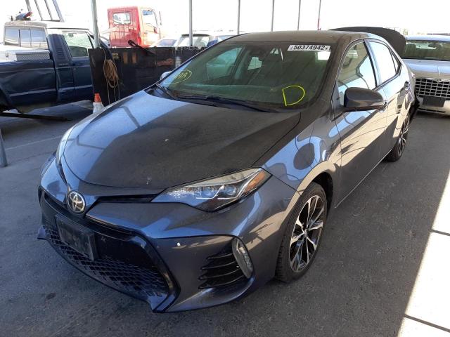 Photo 2 from auction – 2017 TOYOTA COROLLA L with VIN 5YFBURHE8HP697985