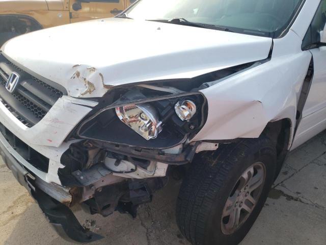 Photo 9 from auction – 2004 HONDA PILOT EXL with VIN 2HKYF18544H518208
