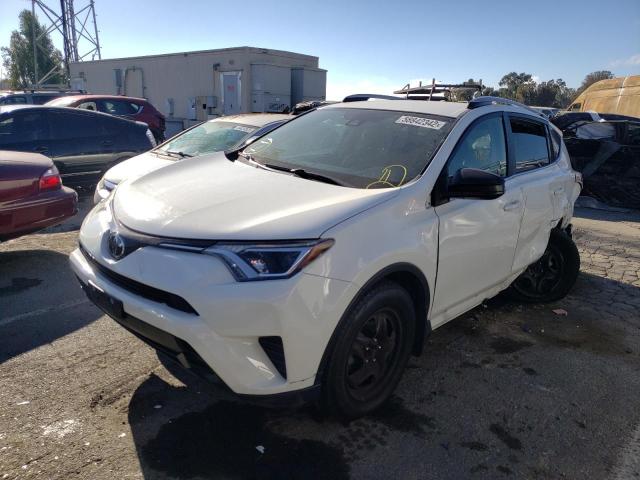 Photo 2 from auction – 2017 TOYOTA RAV4 LE with VIN JTMBFREV5HJ137957