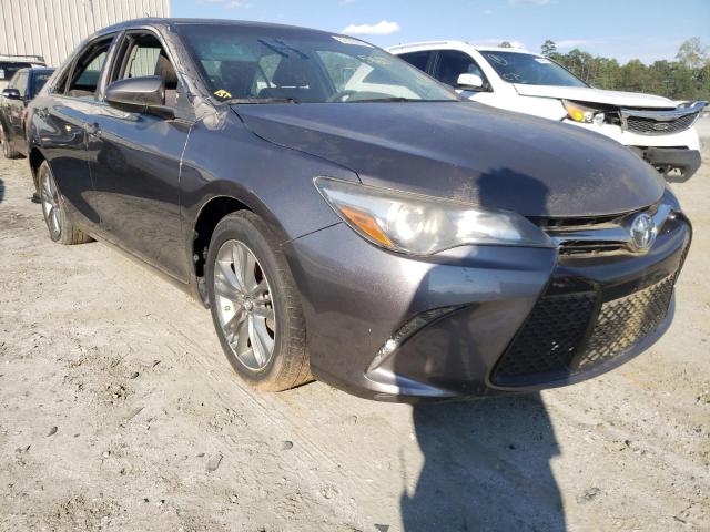 TOYOTA CAMRY LE 2017 with VIN 4T1BF1FKXHU686831 - Photo from auction
